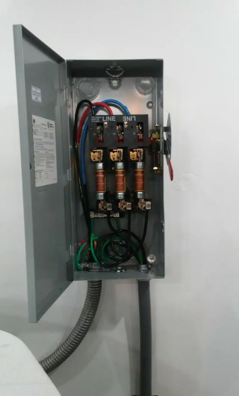 Three-phase disconnect switch installed for Smoke Detector Installation in Denton